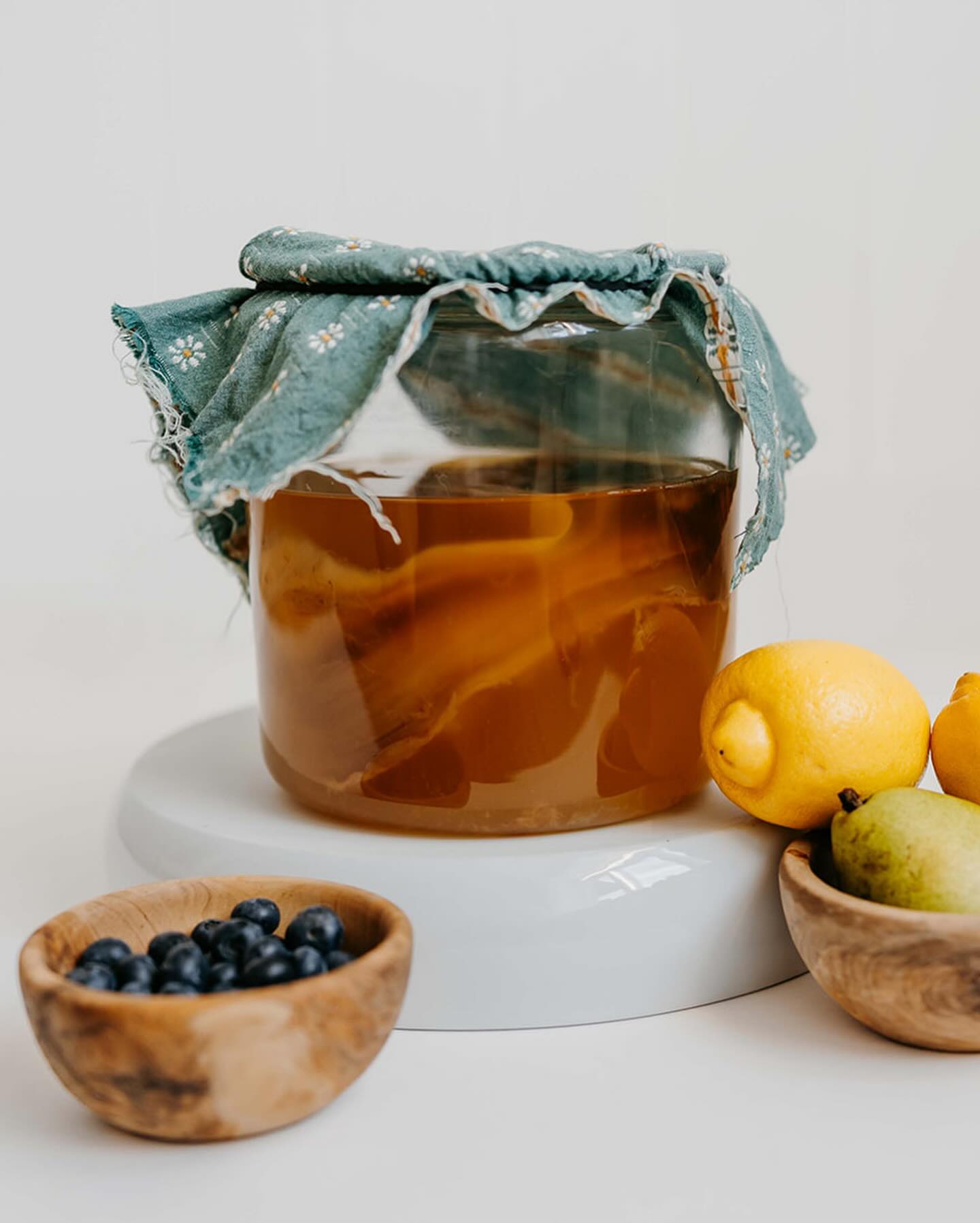 Kombucha jar with fresh fruits